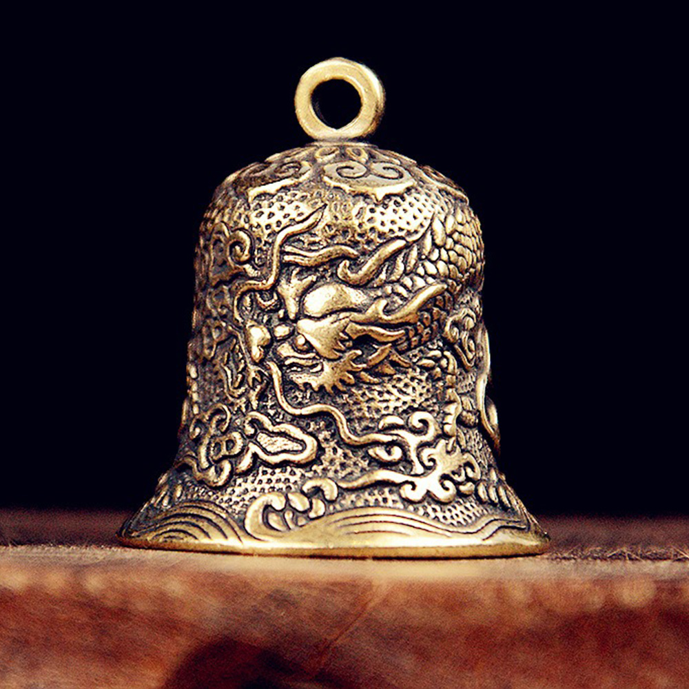 Vintage Brass Bell Carved Drag - Vintage Collectible Bells review and price