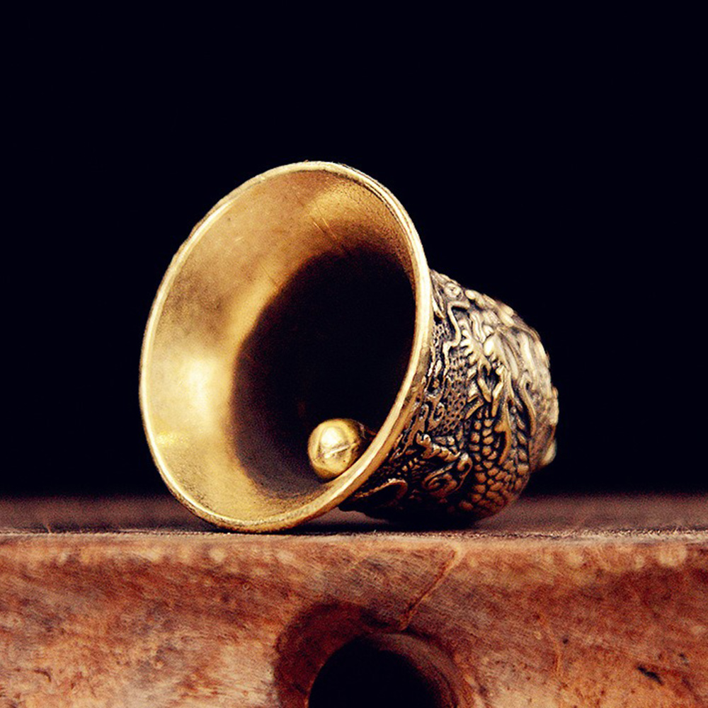 Vintage Brass Bell Carved Drag - Vintage Collectible Bells review and price