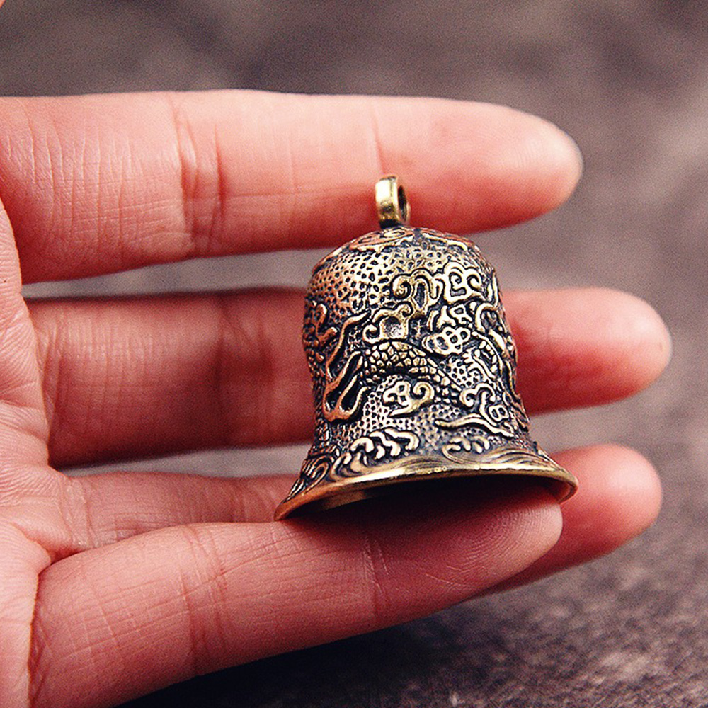 Vintage Brass Bell Carved Drag - Vintage Collectible Bells review and price